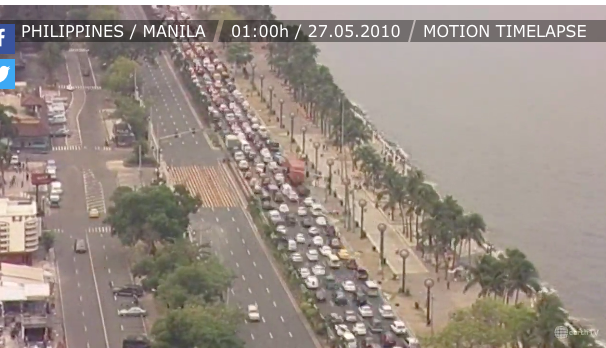 An aerial view of a city street
Description automatically generated